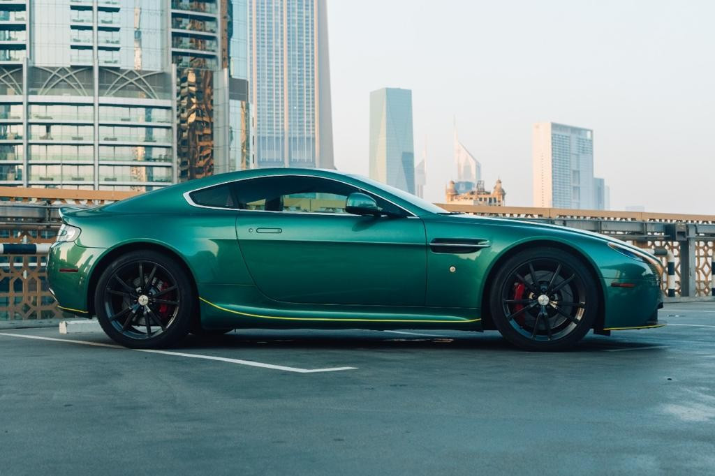 Looking to rent a Aston Martin Vantage (Green), 2015 in Dubai? Discover great prices, instant booking, and top service.